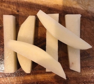 Raw thick cut potatoes